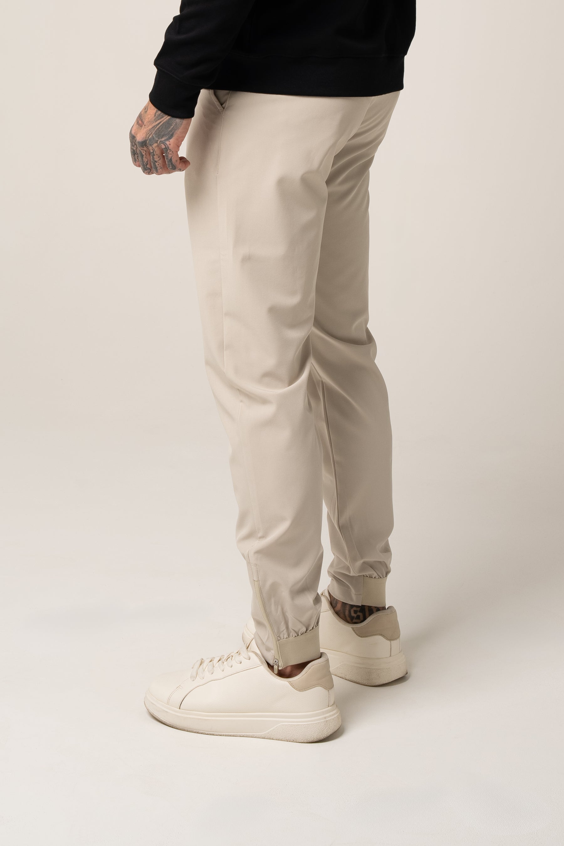 SANDRO tech stretch TROUSERS in BEIGE