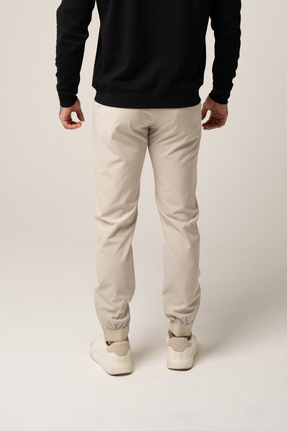 SANDRO tech stretch TROUSERS in BEIGE