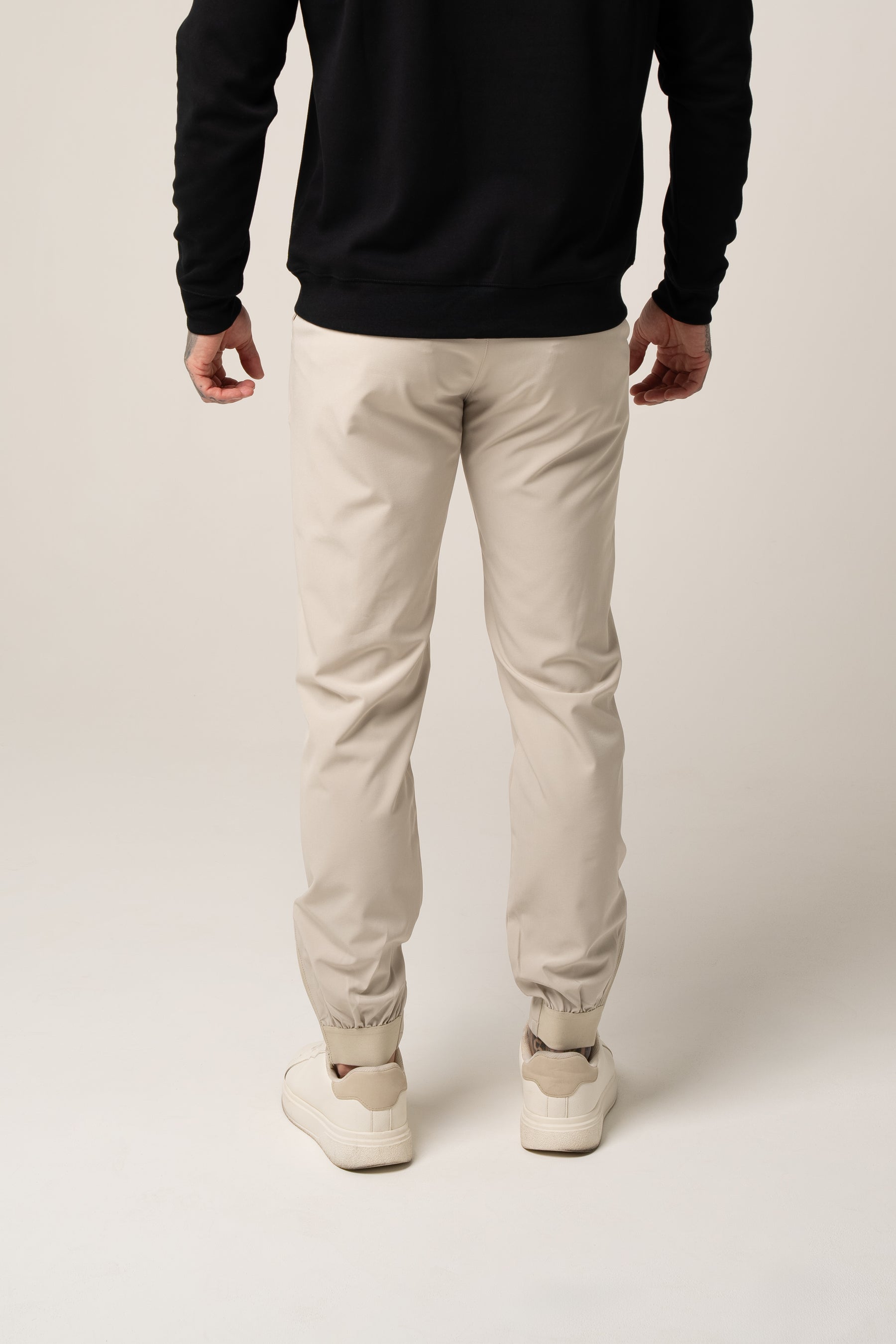 SANDRO tech stretch TROUSERS in BEIGE