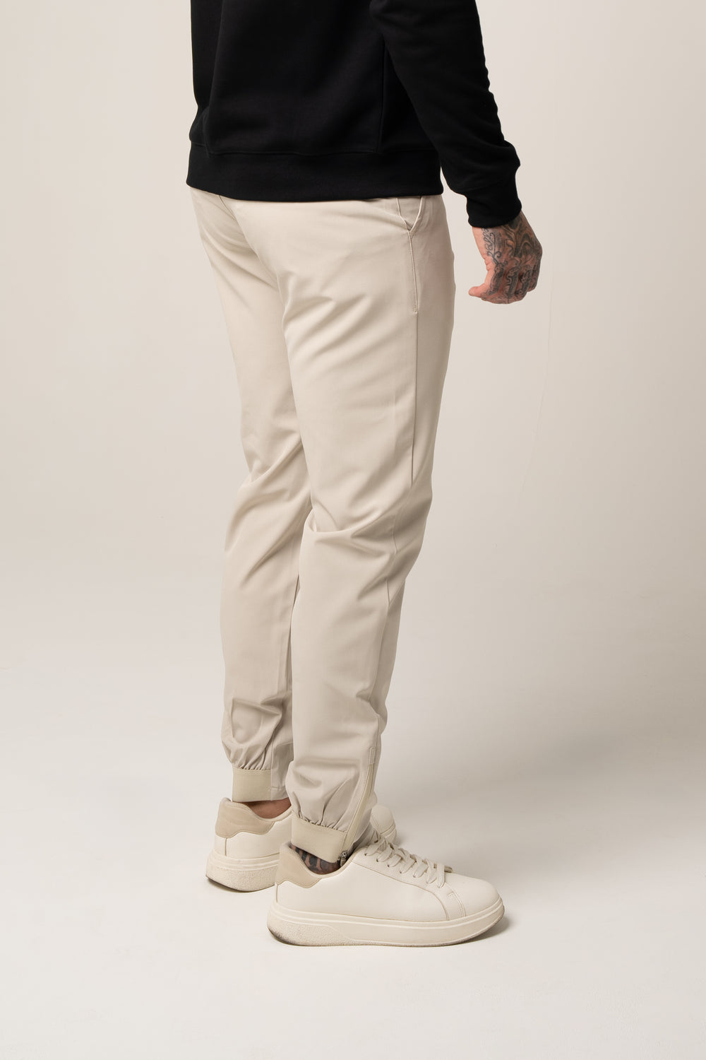 SANDRO tech stretch TROUSERS in BEIGE
