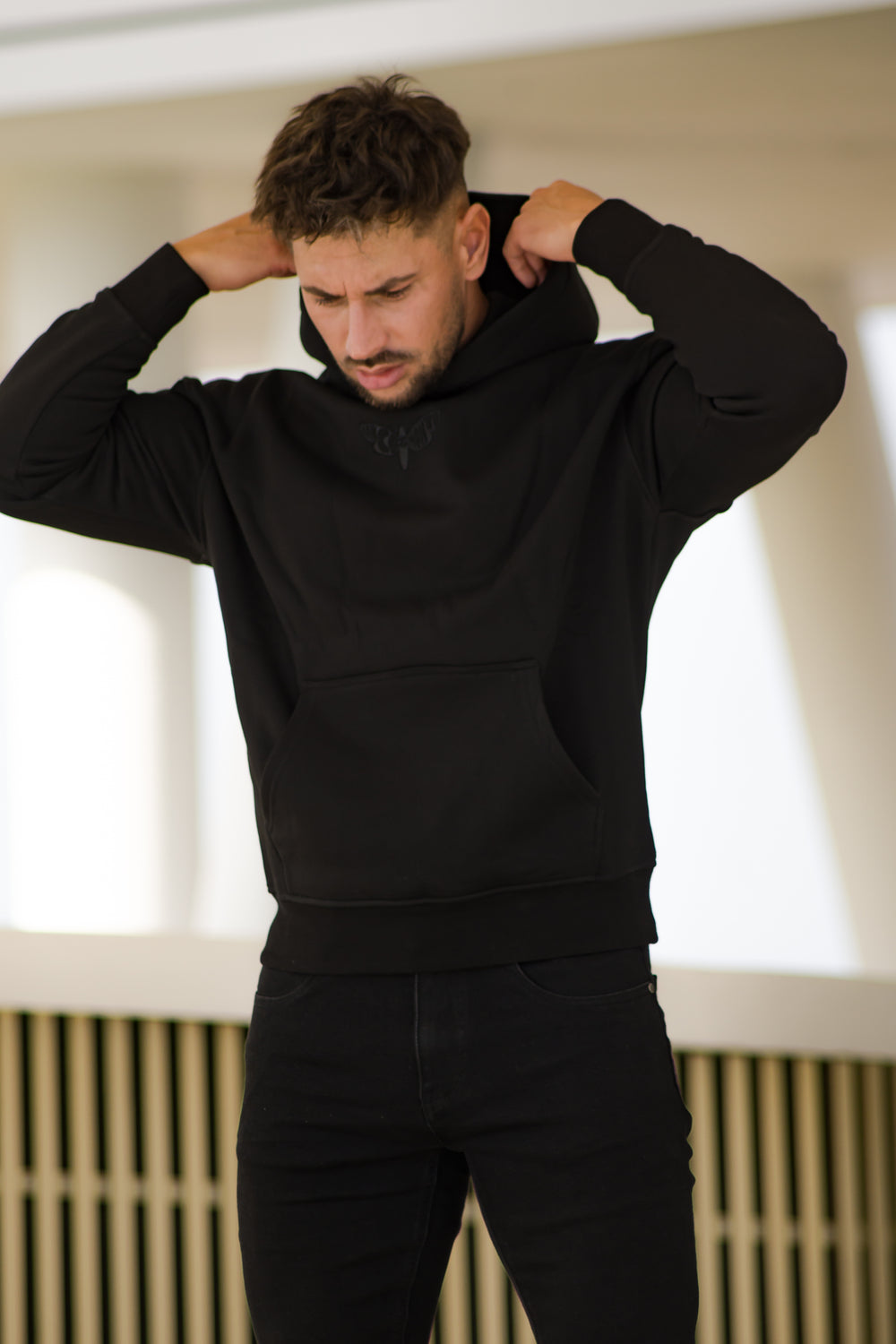 Sudadera con capucha LUCA en negro